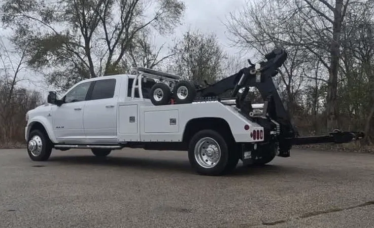 Chicago wrecker equipment securing damaged vehicle